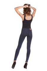 Portrait of a beautiful woman in blue jeans and blue shirt