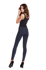 Portrait of a beautiful woman in blue jeans and blue shirt