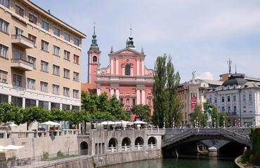 Franciscan Church of the Annunciation and Triple Bridge on the Ljubljanica River in Ljubljana, Slovenia 