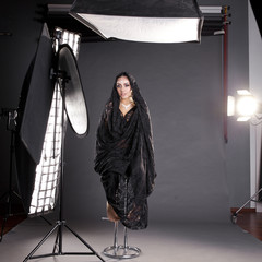 Working conditions in the studio, the photographer photographs t