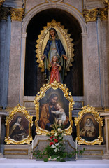 Fototapeta na wymiar Altar of the Virgin Mary in the St Nicholas Cathedral in Ljubljana, Slovenia 