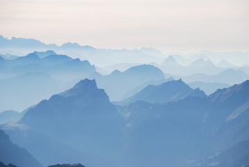Mountain view in the mist Swiss alps