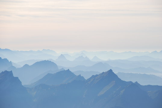 Mountain range in haze Swiss alps