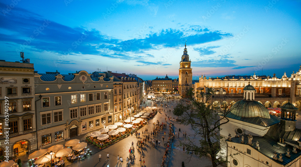 Wall mural krakow market square, poland at sunset