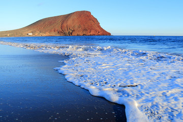 Red mountain in Tenerife, Canary island, Spain. © jroballo