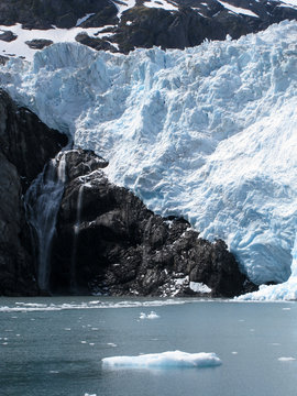 White glacier and black rocks