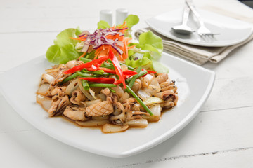 squid. Chinese stir-fried squid with black pepper , garlic and s
