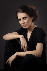 Naklejka premium Beautiful Elegant Woman Wearing Fine Jewelry 