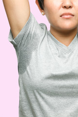 woman with sweating very badly under armpit