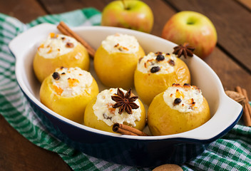 Appetizing baked apples with cottage cheese and raisins