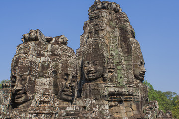 Fototapeta premium Stone head on towers of Bayon temple in Angkor Thom, Cambodia