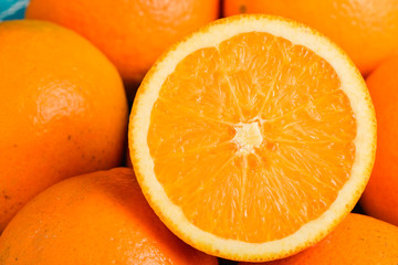 Fresh oranges on wooden blue turquoise table