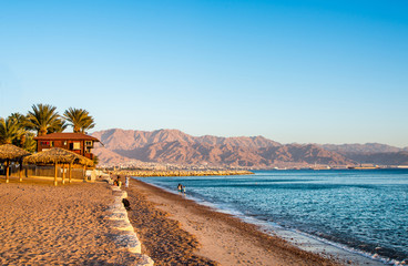 View of Eilat beach, Israel over Aqaba city, Jordan.