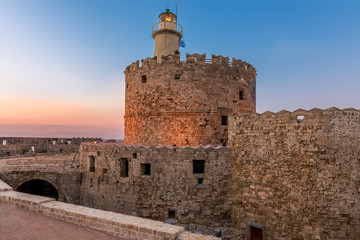 Fototapeta premium Tower and Fort of Saint Nicholas lighthouse in Rhodes, Greece