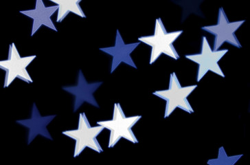 Obraz premium Star bokeh on black