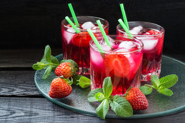 Refreshing drink with strawberries and ice