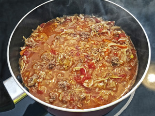 A Steaming Pot of Goulash on the Stove Top