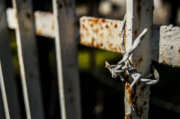 barbed wire on the gate