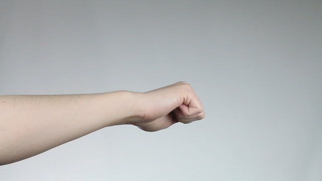 Beautiful woman hand thumb up with manucure nails