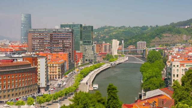Zoom out timelapse of Bilbao in a sunny summer day