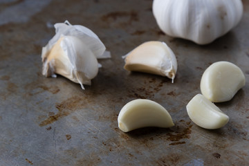 Fototapeta na wymiar garlic on steel plate