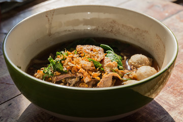 bowl of thai style beef noodle soup