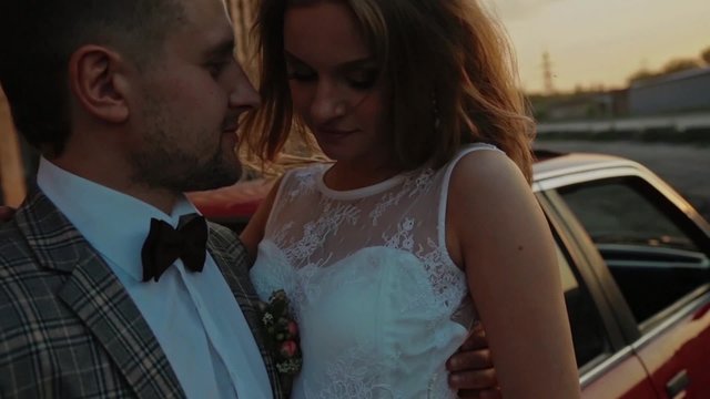 Newlyweds in the sunrays slowmotion