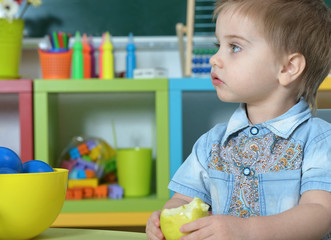 little boy with apple