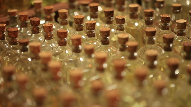 Glass bottles with different scents and exotic types of essential oils.
