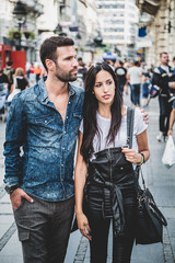 Fototapeta na wymiar Couple walking in the city