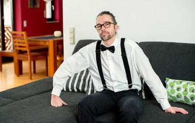 Fototapeta premium bearded man in white shirt with bow-tie