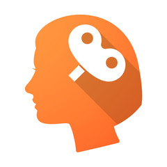 Long shadow female head with a toy crank