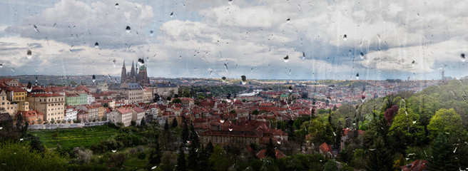 Roofs of Prague, old town behind the glass