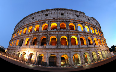 Fototapeta na wymiar Rome Colosseum illuminated at night 