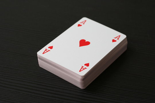 Ace of hearts on the top of the playing cards deck