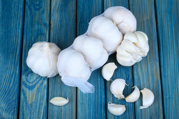 Fototapeta na wymiar Garlic on wooden table