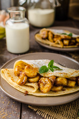 Pancakes stuffed with bananas