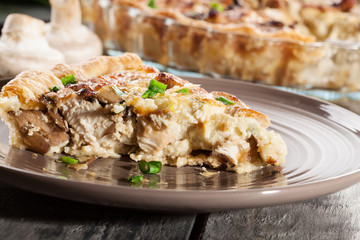 Slice of tart with chicken amd mushrooms