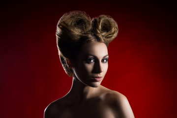 Fototapeta premium Portrait of a beautiful woman with a bizarre haircut