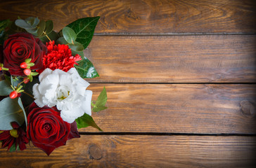 Bouquet of flowers on a wooden table