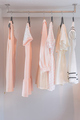 white closet with dress hanging