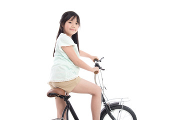 Fototapeta na wymiar Asian girl riding a bike