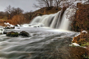 river view with waterfall