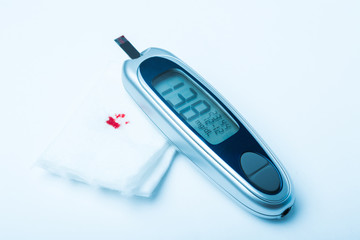 Diabetes patient measuring glucose level blood test using ultra