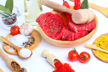 Spice in Wooden Spoon isolated white background
