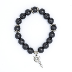Black bracelet with pendant isolated
