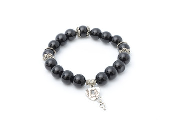 Black bracelet with pendant isolated