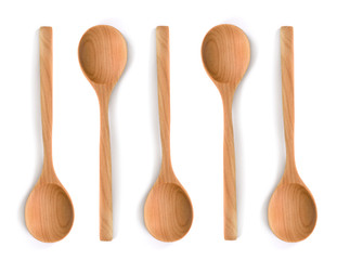 Wooden spoon on isolated background