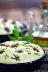 Italian Focaccia bread with olives and rosemary  