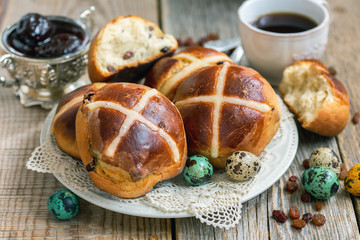 Dish with English Easter buns close up.